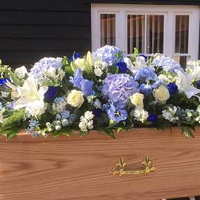 Blue and white coffin spray